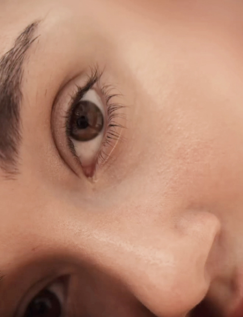 Brown eyed woman looking at camera