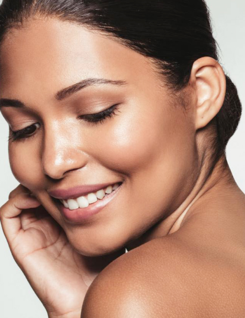 shot of a beautiful young woman posing against a white background